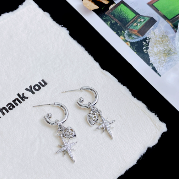 八芒心石リボンピアス