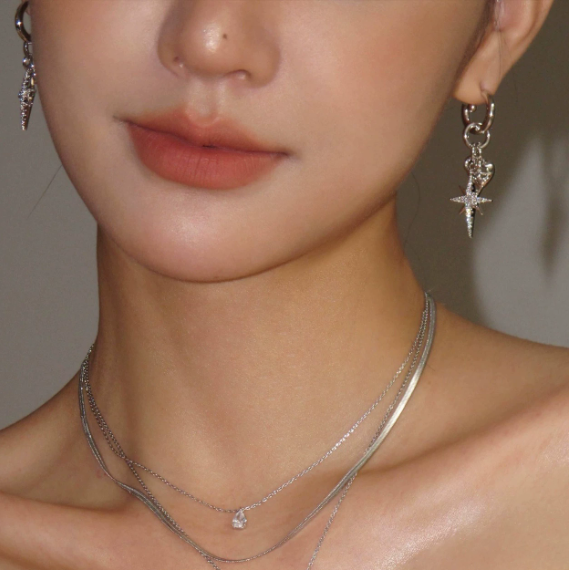 八芒心石リボンピアス